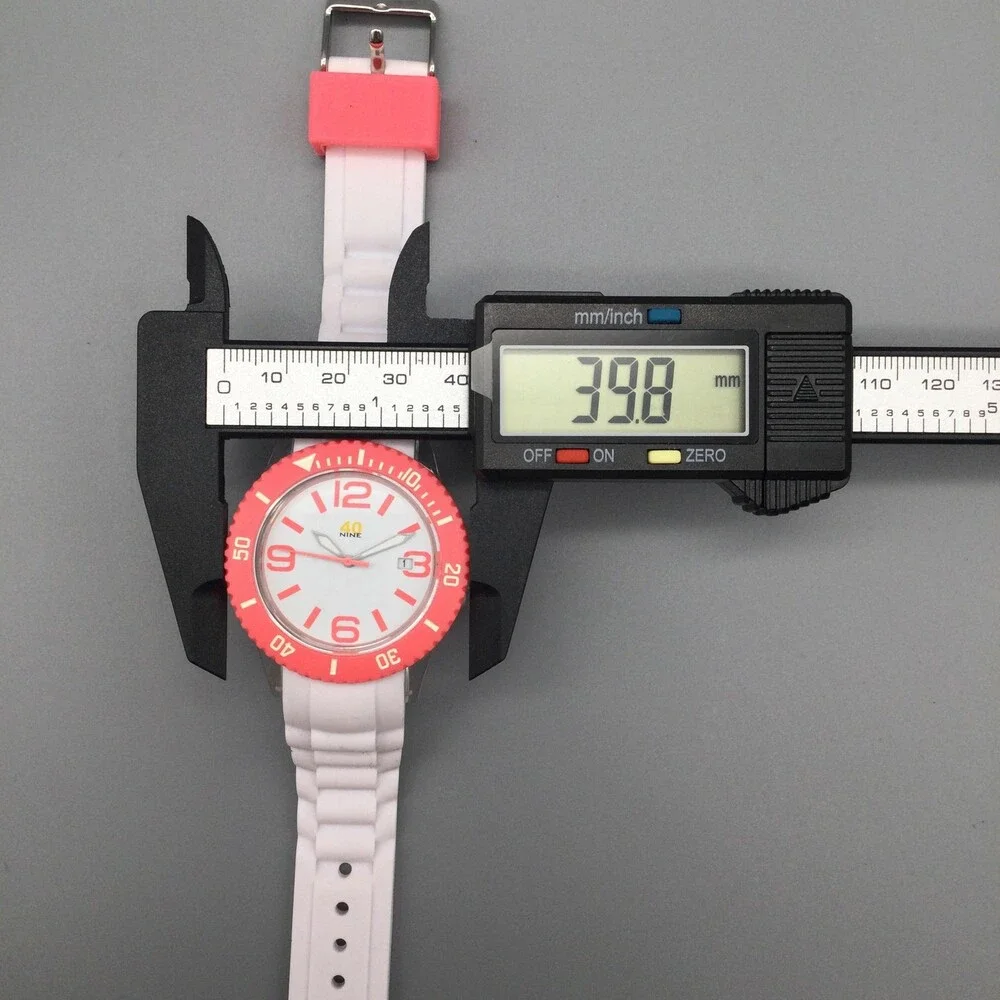 40nine Womens Watch 40mm Pink Case White Silicone Strap Date Quartz 50m